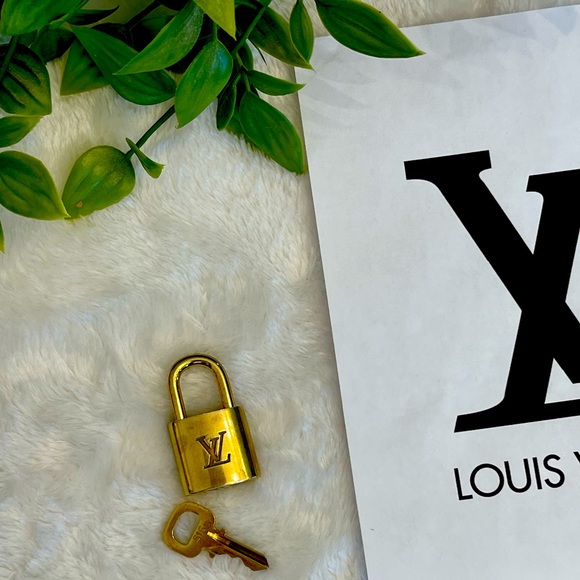 Louis Vuitton Handbags - LV Louis Vuitton brass lock and key authentic